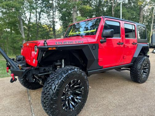 Red 2014 Jeep Wrangler Unlimited Rubicon