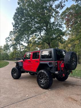 Red 2014 Jeep Wrangler Unlimited Rubicon