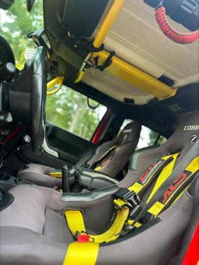 Red 2014 Jeep Wrangler Unlimited Rubicon