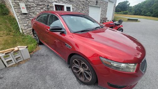 Red 2015 Ford Taurus SHO