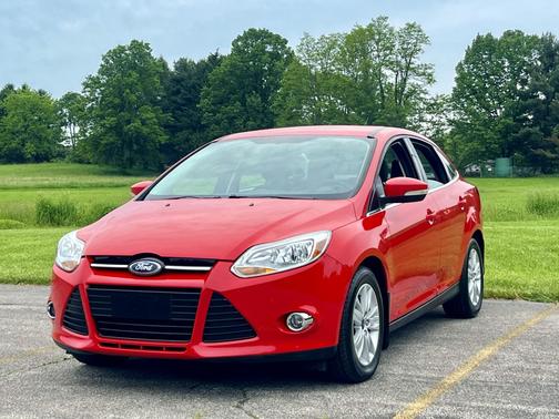 Red 2012 Ford Focus SEL