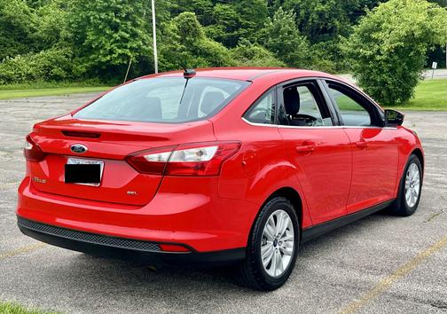 Red 2012 Ford Focus SEL