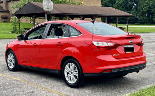 Red 2012 Ford Focus SEL