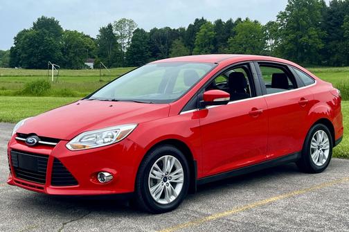 Red 2012 Ford Focus SEL