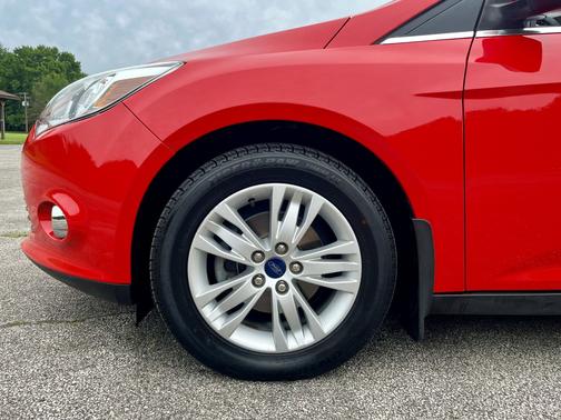 Red 2012 Ford Focus SEL
