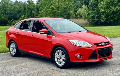 Red 2012 Ford Focus SEL