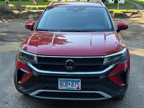 Red 2024 Volkswagen Taos SE 4MOTION