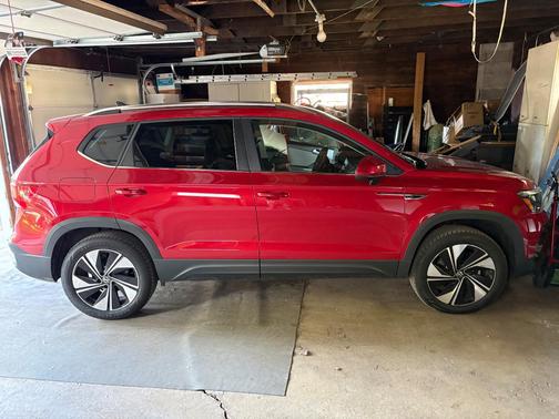 Red 2024 Volkswagen Taos SE 4MOTION