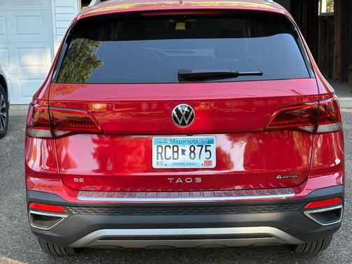 Red 2024 Volkswagen Taos SE 4MOTION