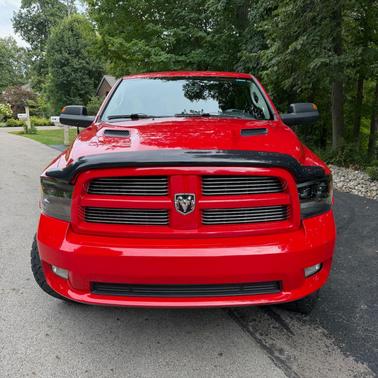 Red 2012 RAM 1500 Sport