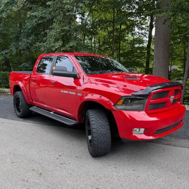 Red 2012 RAM 1500 Sport