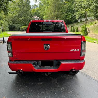 Red 2012 RAM 1500 Sport