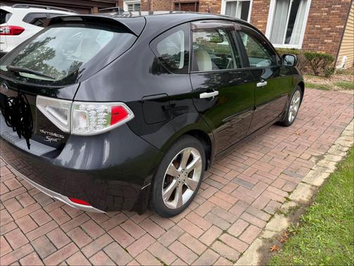 Black 2011 Subaru Impreza Outback Sport Base