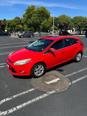 Red 2012 Ford Focus SEL