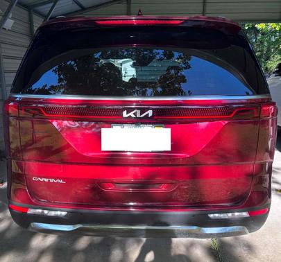 Red 2024 Kia Carnival SX Prestige