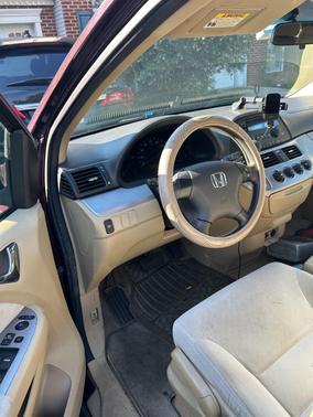 Red 2009 Honda Odyssey LX