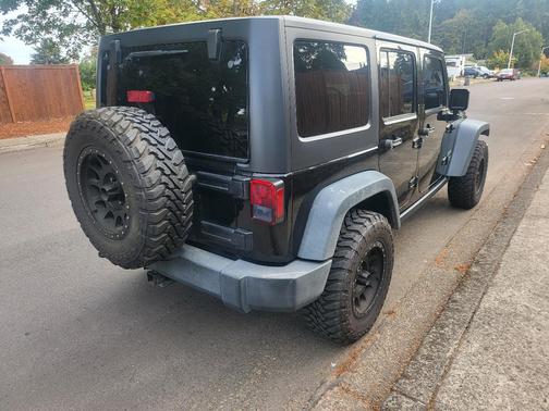 Black 2017 Jeep Wrangler Unlimited Sport