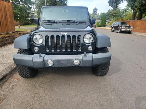 Black 2017 Jeep Wrangler Unlimited Sport