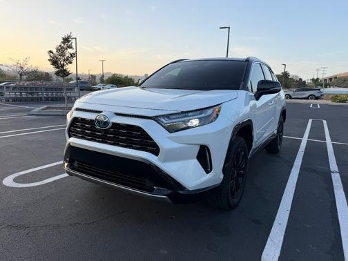 White 2023 Toyota RAV4 Hybrid XSE