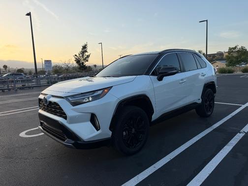 White 2023 Toyota RAV4 Hybrid XSE