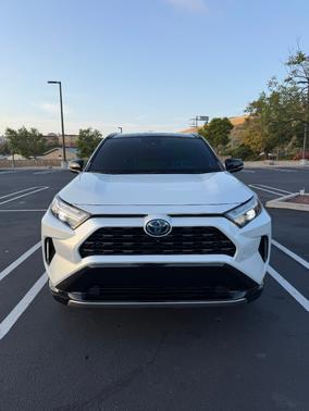White 2023 Toyota RAV4 Hybrid XSE