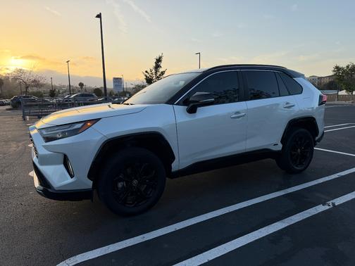 White 2023 Toyota RAV4 Hybrid XSE