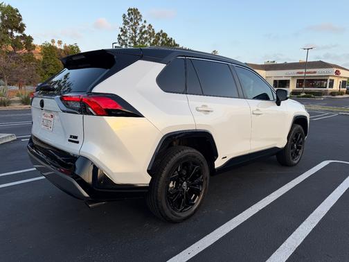 White 2023 Toyota RAV4 Hybrid XSE