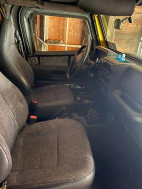Yellow 2001 Jeep Wrangler Sport