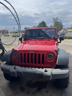 Red 2009 Jeep Wrangler Unlimited X