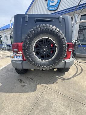 Red 2009 Jeep Wrangler Unlimited X