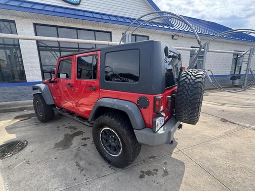 Red 2009 Jeep Wrangler Unlimited X