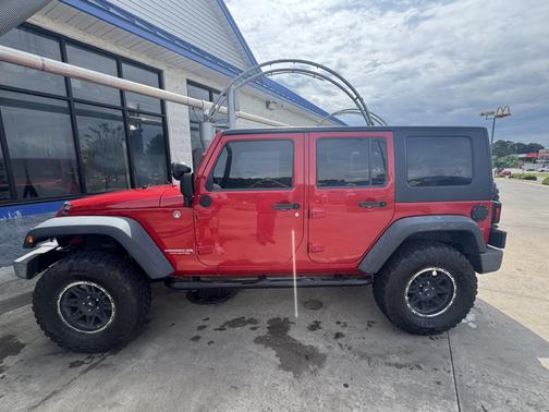 Red 2009 Jeep Wrangler Unlimited X