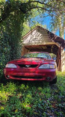 Red 1996 Ford Mustang Cobra