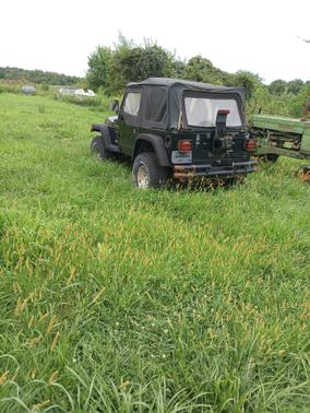 Black 1998 Jeep Wrangler Sport