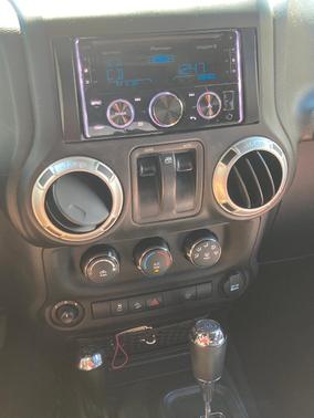 Gray 2014 Jeep Wrangler Sahara