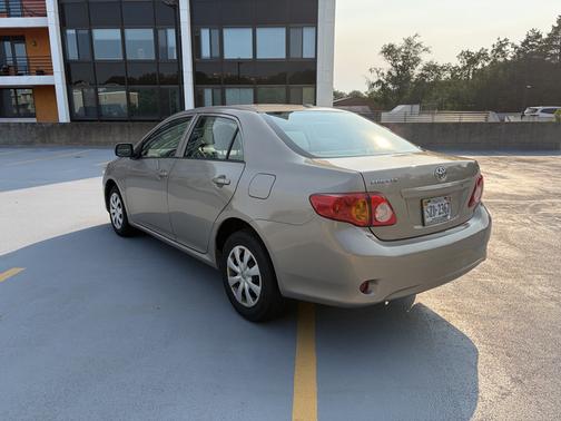 Beige 2010 Toyota Corolla LE