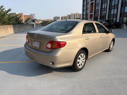 Beige 2010 Toyota Corolla LE