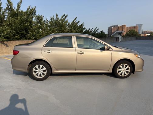 Beige 2010 Toyota Corolla LE