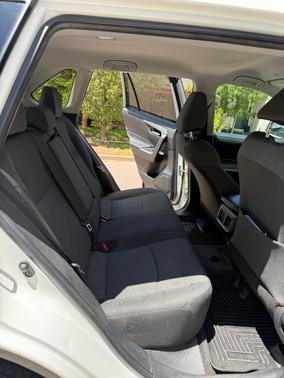 White 2023 Toyota RAV4 XLE