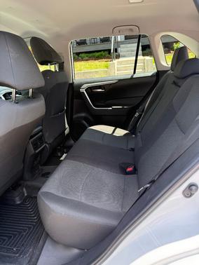 White 2023 Toyota RAV4 XLE