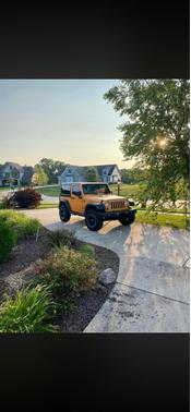 Orange 2013 Jeep Wrangler Sport