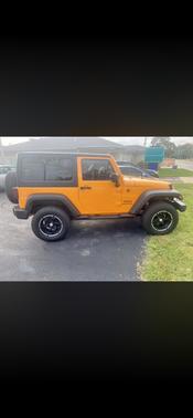 Orange 2013 Jeep Wrangler Sport