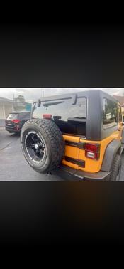 Orange 2013 Jeep Wrangler Sport