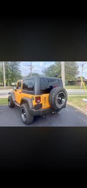 Orange 2013 Jeep Wrangler Sport