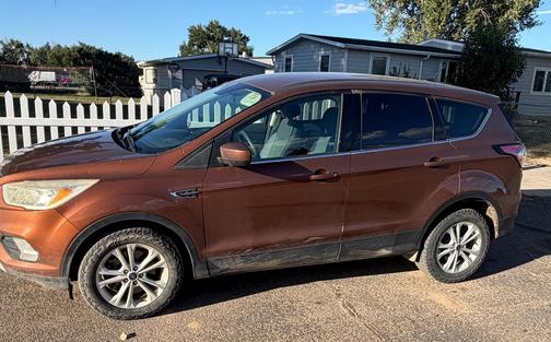 Orange 2017 Ford Escape SE