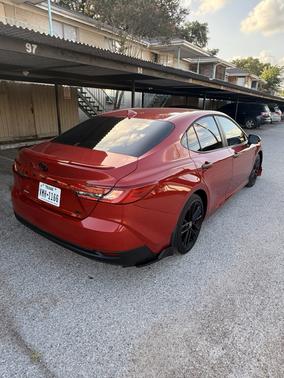 Red 2025 Toyota Camry LE