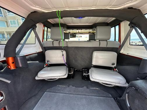 Orange 2010 Jeep Wrangler Unlimited Sport