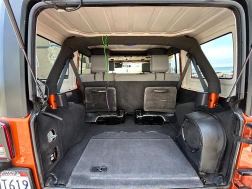 Orange 2010 Jeep Wrangler Unlimited Sport