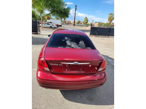Red 2003 Ford Taurus SEL