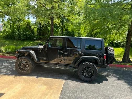 Black 2016 Jeep Wrangler Unlimited Willys Wheeler
